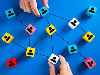 interlinked blocks with pictures of people on them